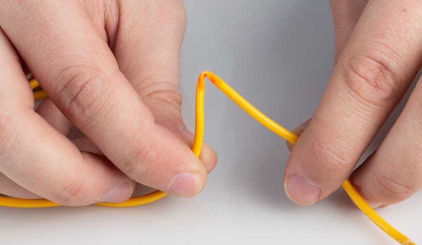 Fiber Optic Technician bending fiber